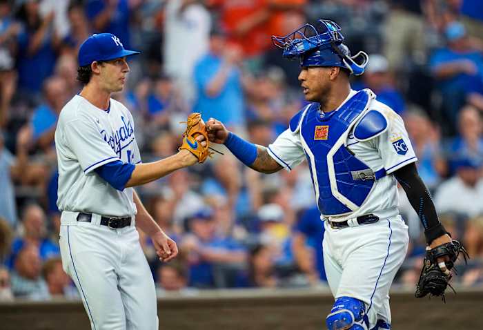 Aug 17, 2021; Kansas City, Missouri, USA; Kansas City Royals starting pitcher Daniel Lynch (52) celebrates with Kansas City Royals catcher Salvador Perez (13) after the third inning against the Houston Astros at Kauffman Stadium. Mandatory Credit: Jay Biggerstaff-USA TODAY Sports
